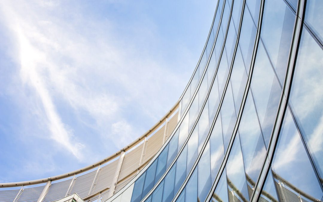 Corporate building exterior with blue sky