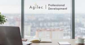 Office building window looking outwards with Agilec logo and page title