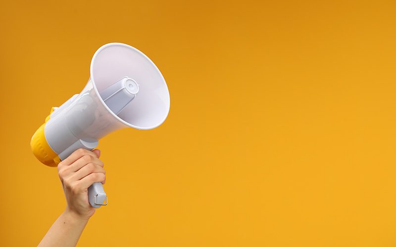 Woman holding megaphone